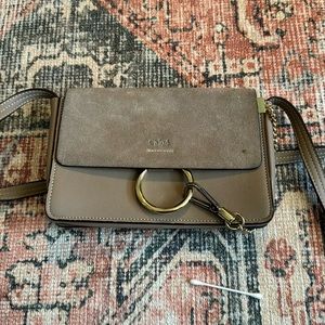 Beige tan leather crossbody bag gold details